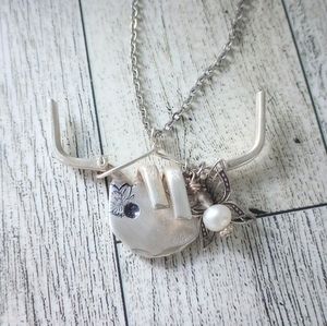 Cute highland cow made from a vintage silver fork